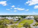 Stunning aerial view of a grand estate nestled on a waterfront property at 9196 Players Dr, Weeki Wachee, FL 34613
