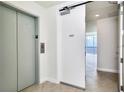Building entrance with elevator and apartment number at 2900 Bay To Bay Blvd # 1502, Tampa, FL 33629