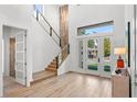 Bright entryway with hardwood floors and modern staircase at 4304 W Sevilla St, Tampa, FL 33629