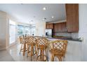Kitchen island with seating for four at 320 Ibisview Lane # 33572, Apollo Beach, FL 33572