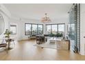 Bright living room with hardwood floors, city views, and a wine wall at 449 S 12Th St # 2405, Tampa, FL 33602