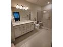 Bathroom with double vanity, large shower and walk-in accessibility at 12831 Oriago St, Venice, FL 34293