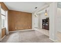 Spacious living room with large window and neutral decor at 3001 Silvermill Loop, Land O Lakes, FL 34638