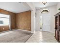 Inviting entryway with tiled floors and neutral wall colors at 3001 Silvermill Loop, Land O Lakes, FL 34638