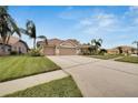 Large house with three car garage and plenty of curb appeal at 10301 Manta Way, Tampa, FL 33615