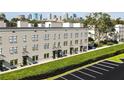 Townhouses with parking and landscaping near the city skyline at 1218 E Kay St # 26, Tampa, FL 33602