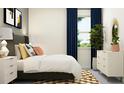 Bright bedroom with dark-blue curtains, and a dresser at 12724 Tahitian Pearl Cir, Parrish, FL 34219