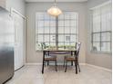 Cozy kitchen breakfast nook with a table and two chairs at 34841 Double Eagle Ct, Zephyrhills, FL 33541