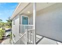 Exterior view showing building entrance and stairs at 1013 Apollo Beach Blvd # 202, Apollo Beach, FL 33572