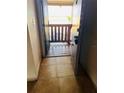 Simple entryway with door leading to balcony at 9035 Westchester Cir # 135, Tampa, FL 33604