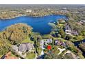 Aerial view showcasing the home's waterfront location and surrounding properties at 806 Taray De Avila, Tampa, FL 33613
