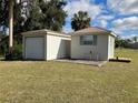 Detachable garage and workshop provide ample storage space at 29098 Riverview Ln, Punta Gorda, FL 33982