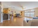 Spacious living room with hardwood floors, and ample natural light at 37532 New Horizons Blvd, Zephyrhills, FL 33541