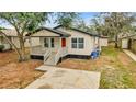 Newly built single story home with front yard at 3721 Wiggins Leaf St, Tampa, FL 33619