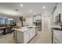 Spacious kitchen featuring stainless steel appliances and an island at 31396 Cabana Rye Ave, San Antonio, FL 33576