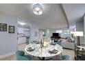Open concept dining area with kitchen and living room at 3315 58Th S Ave # 306, St Petersburg, FL 33712