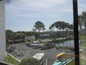 View of marina, boats, and distant cityscape at 2424 W Tampa Bay Blvd # L202, Tampa, FL 33607