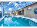 Screened-in pool area with spacious patio at 2634 Brookville Dr, Valrico, FL 33596
