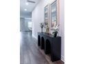 Bright and spacious hallway with contemporary console table at 211 W Giddens Ave, Tampa, FL 33603