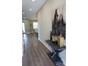 Bright entryway with hardwood floors and decor at 213 W Giddens Ave, Tampa, FL 33603