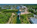 Aerial view of a waterfront lot and boat ramp at 3171 Sea Grape Dr, Hernando Beach, FL 34607