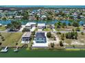 Aerial shot of the beautiful home and the surrounding neighborhood, featuring waterfront views at 3230 Azalea Drive # Lot 13, Hernando Beach, FL 34607