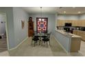 Kitchen nook with small table and chairs at 2822 Torrance Dr, Land O Lakes, FL 34638