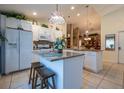 Spacious kitchen featuring granite countertops and white cabinetry at 7532 Regents Garden Way, Apollo Beach, FL 33572