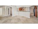 Open living area with tile floors and kitchen at 2413 Bayshore Blvd # 2004, Tampa, FL 33629