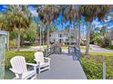 Private dock with seating, offering picturesque waterfront views at 814 S Bayside Dr, Tampa, FL 33609