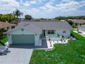 Aerial view of a charming single story home with a nicely landscaped yard at 1508 Fort Duquesna Dr, Sun City Center, FL 33573