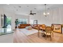Elegant living room with leather sectional and hardwood floors at 111 N Albany Ave # 16, Tampa, FL 33606