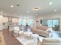 Bright and airy living room with open floor plan at 17423 Metcalf Ave, Port Charlotte, FL 33954