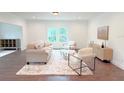 Elegant living room with hardwood floors at 17423 Metcalf Ave, Port Charlotte, FL 33954