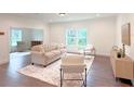Open concept living room with neutral decor at 17423 Metcalf Ave, Port Charlotte, FL 33954