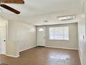 Living room featuring tile flooring and neutral color walls at 3615 Wellington Dr, Holiday, FL 34691