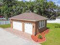 Two-car detached garage with a unique design at 849 John Cressler Dr, Seffner, FL 33584