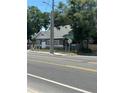 Street view of gray house on corner lot at 3008 N Nebraska Ave, Tampa, FL 33603