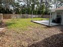 Large backyard with a patio and wooden fence at 3839 Alabama Ne Ave, St Petersburg, FL 33703