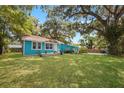 Charming home with a spacious green lawn at 2601 N Wilder Loop, Plant City, FL 33565