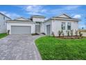Stylish single-Gathering home boasting a well-maintained lawn and multiple-car garage at 8328 Golden Beach Ct, Parrish, FL 34219