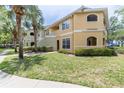 Two-story building with lush landscaping and walkways at 1228 S. Missouri Ave # 607, Clearwater, FL 33756