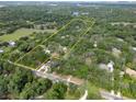 Aerial view showing property boundaries and surrounding landscape at 7813 Valrie Ln, Riverview, FL 33569