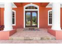 Double front doors with decorative glass and tile flooring at 614 Vintage Way, Brandon, FL 33511