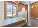 Elegant entryway with double doors and decorative glass, leading to a tiled foyer at 614 Vintage Way, Brandon, FL 33511