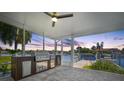 Outdoor kitchen with stainless steel appliances and water views at 4749 Lansing Ne St, St Petersburg, FL 33703