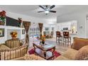 Bright and airy living room with view to the pool at 12711 Royal George Ave, Odessa, FL 33556