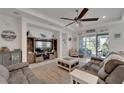 Spacious living room with a neutral color palette and plenty of natural light at 5239 Admiral Pointe Dr, Apollo Beach, FL 33572