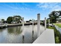 Private dock with walkway over the water at 6540 Simone Shores Cir, Apollo Beach, FL 33572