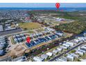 An aerial view of waterfront homes with convenient access to the beautiful waterways and the scenic bay at 6542 Simone Shores Cir, Apollo Beach, FL 33572